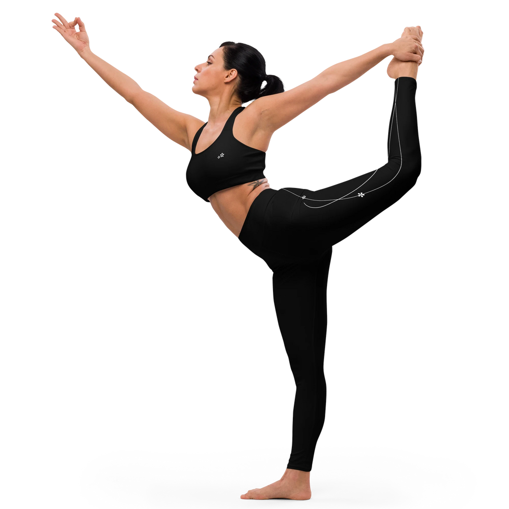 DuelStars Core Femme floral print yoga leggings in motion - woman performing yoga pose showing flexibility and fit.