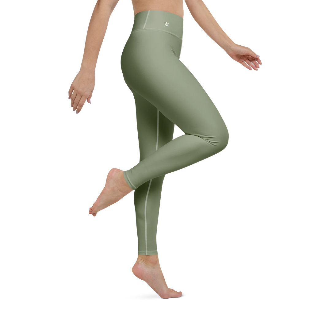 DuelStars Core Femme sage green yoga leggings - right side leg view showing stretch and floral blossom detail.