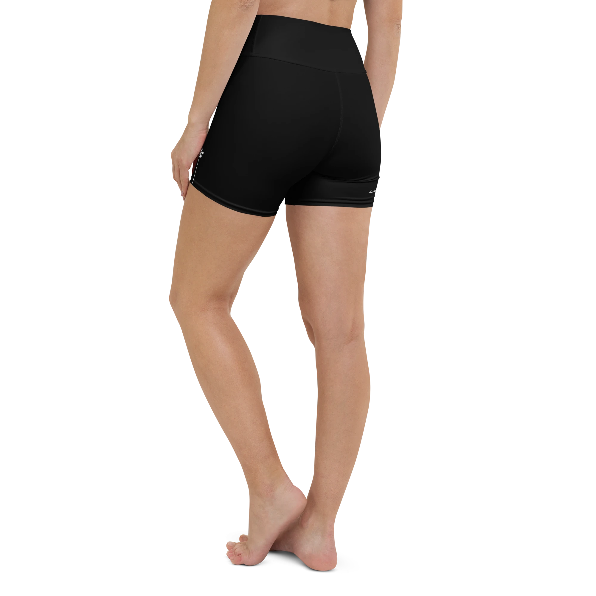 DuelStars black yoga shorts with white floral print, back view