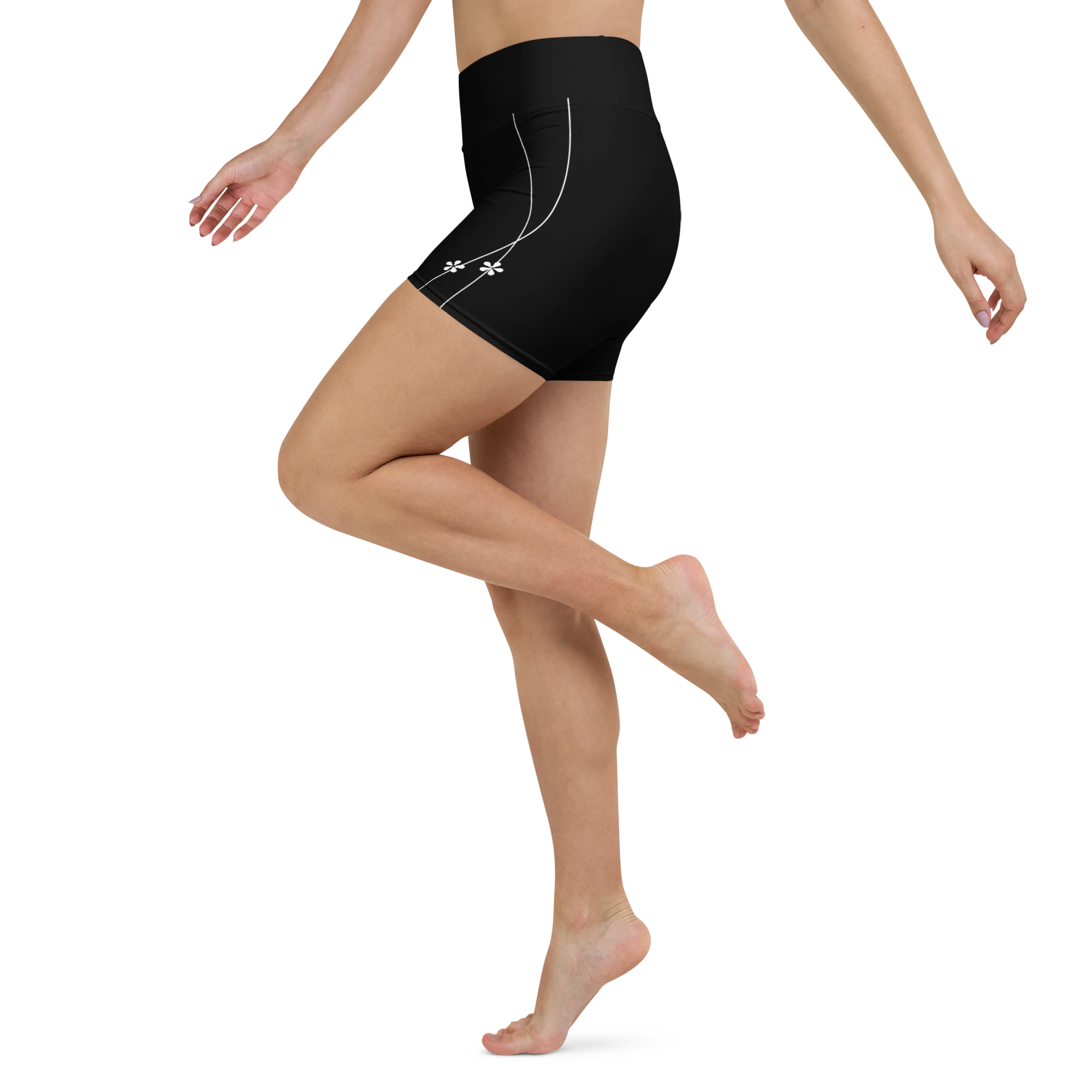 DuelStars black yoga shorts with white floral print, side leg view