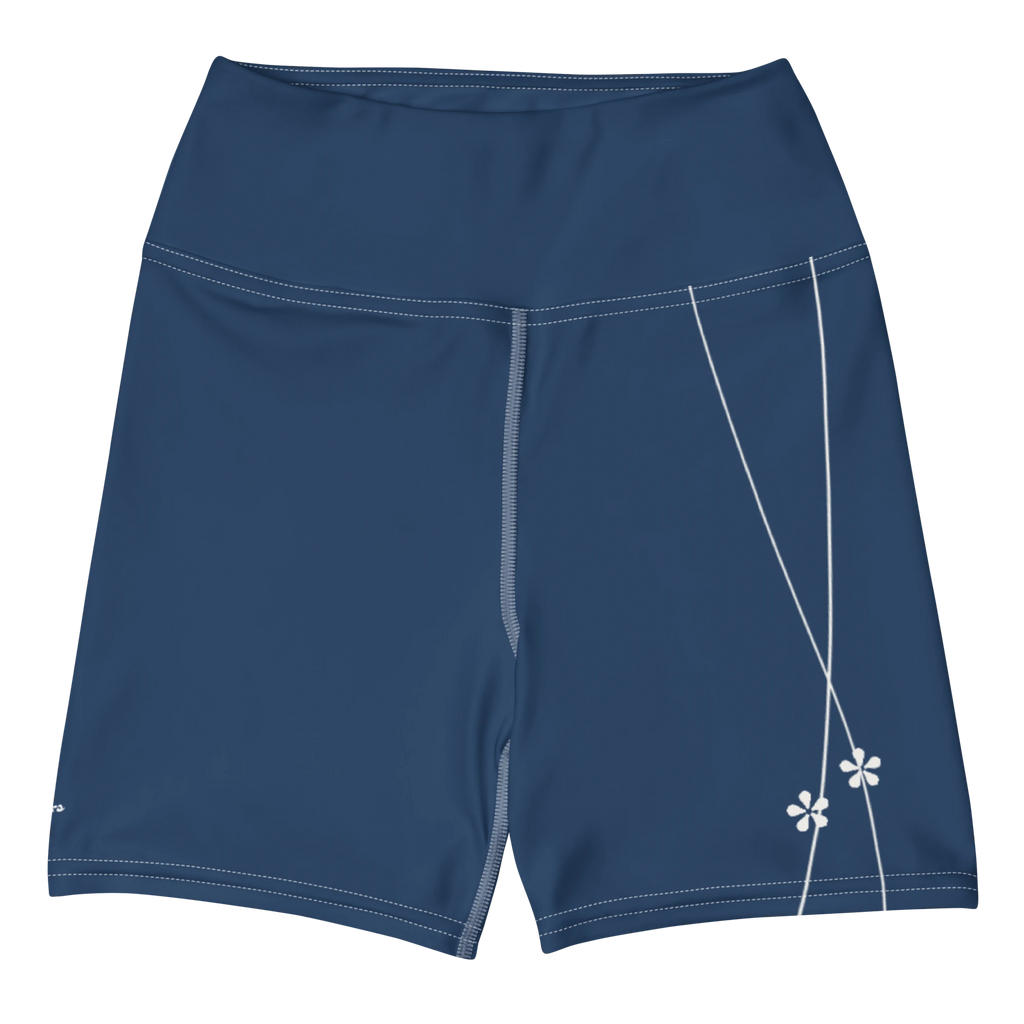 DuelStars ocean blue yoga shorts with white floral print, flat lay front view