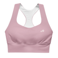 Front view flat lay of the DuelStars Core Femme sports bra in dusty rose, featuring the delicate Blossom logo on the chest.