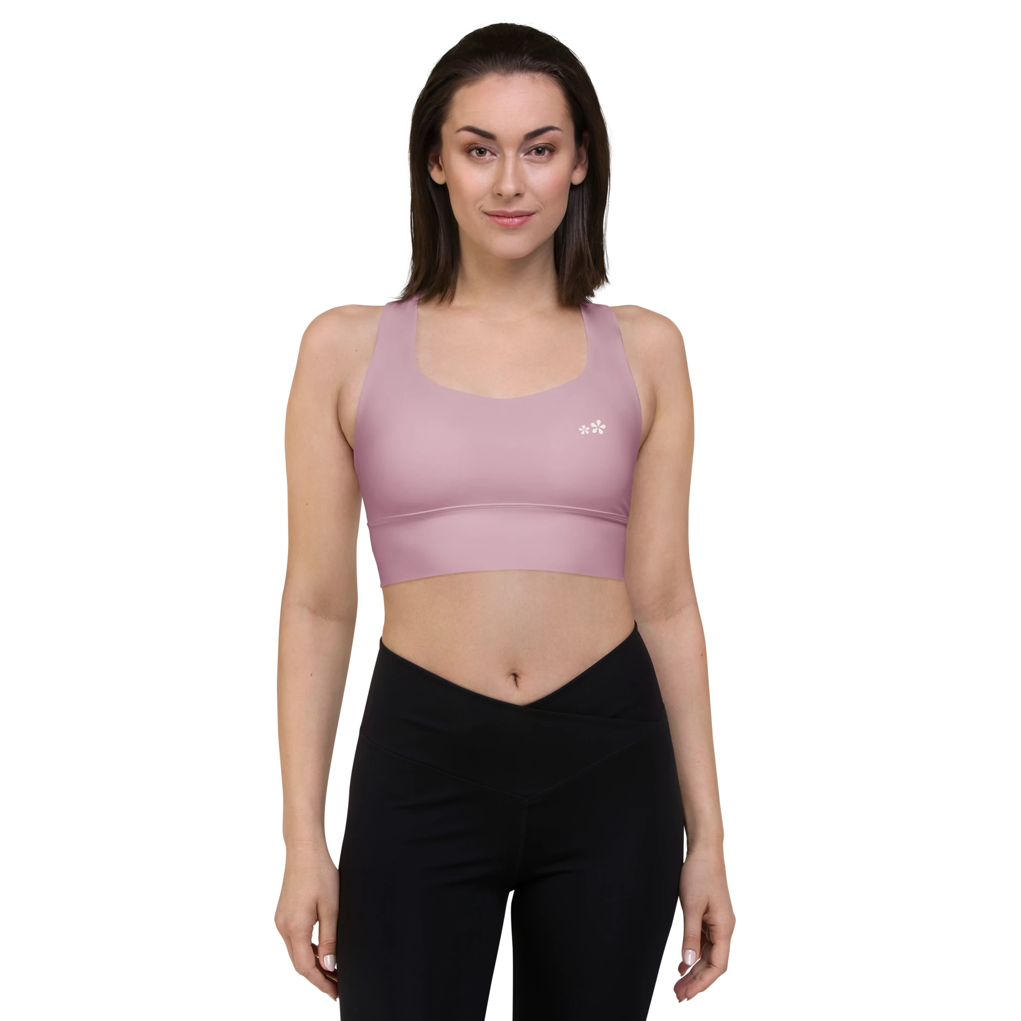 Front front view of the DuelStars Core Femme yoga sports bra in dusty rose, showcasing the delicate floral print and the fit of the straps.