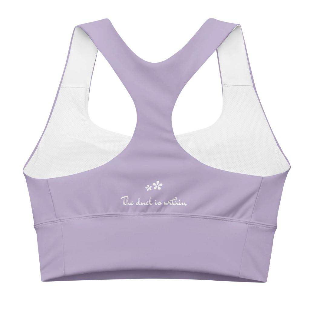Back view flat lay of the DuelStars Core Femme sports bra in misty lavender, featuring the inspirational slogan 'the duel is within' printed across the back.