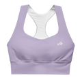 Front view flat lay of the DuelStars Core Femme sports bra in misty lavender, featuring the delicate Blossom logo on the chest.