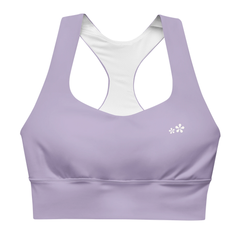 Front view flat lay of the DuelStars Core Femme sports bra in misty lavender, featuring the delicate Blossom logo on the chest.
