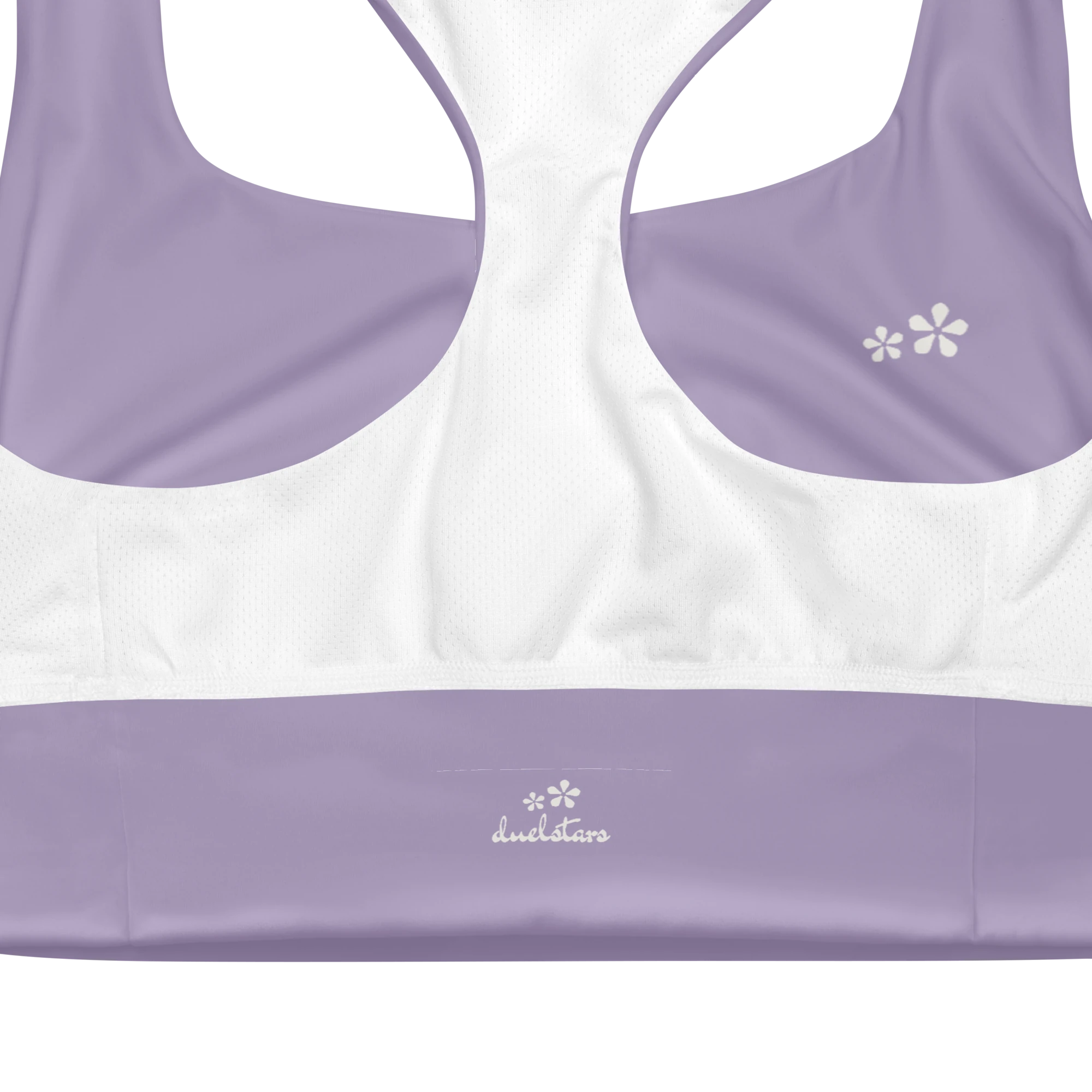 Close-up view of the inside label on the DuelStars Core Femme sports bra in misty lavender, showing the branded DuelStars logo 