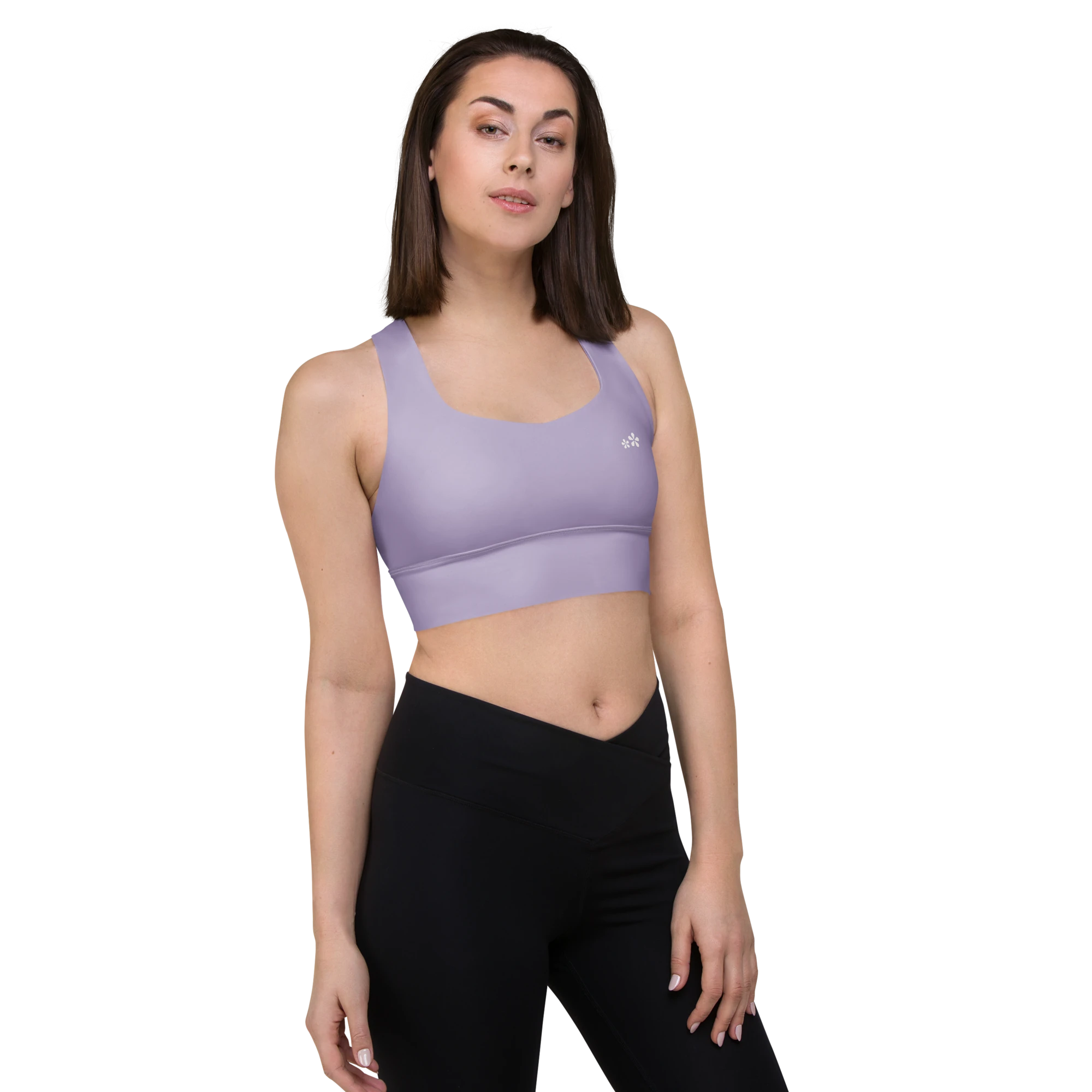 Front right-side view of the DuelStars Core Femme yoga sports bra in misty lavender, showcasing the delicate floral print and the fit of the straps.