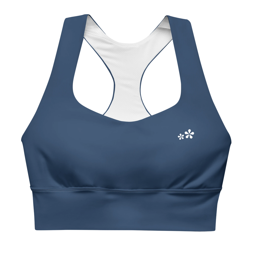 Front view flat lay of the DuelStars Core Femme sports bra in ocean blue, featuring the delicate Blossom logo on the chest.