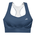Front view flat lay of the DuelStars Core Femme sports bra in ocean blue, featuring the delicate Blossom logo on the chest.