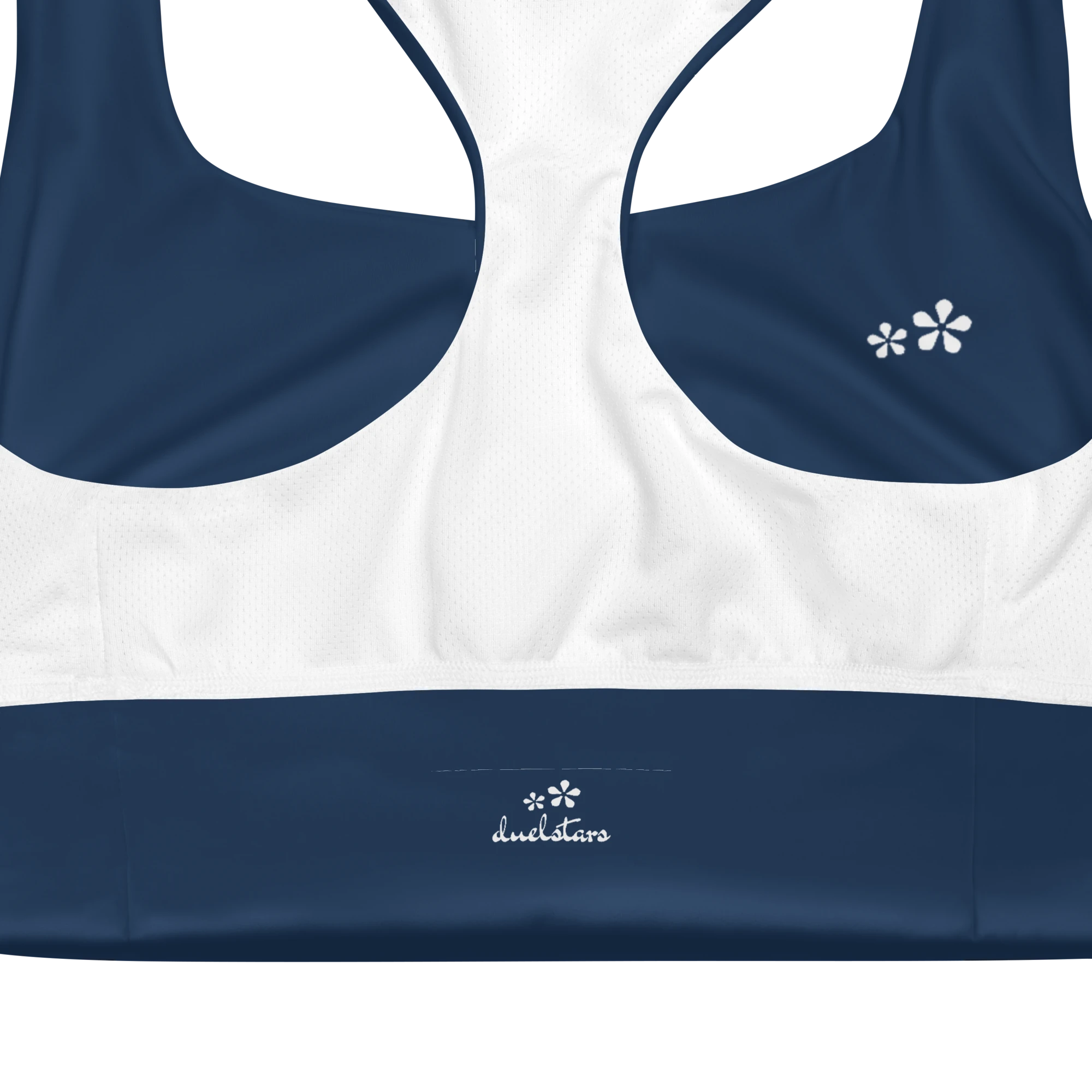 Close-up view of the inside label on the DuelStars Core Femme sports bra in ocean blue, showing the branded DuelStars logo 