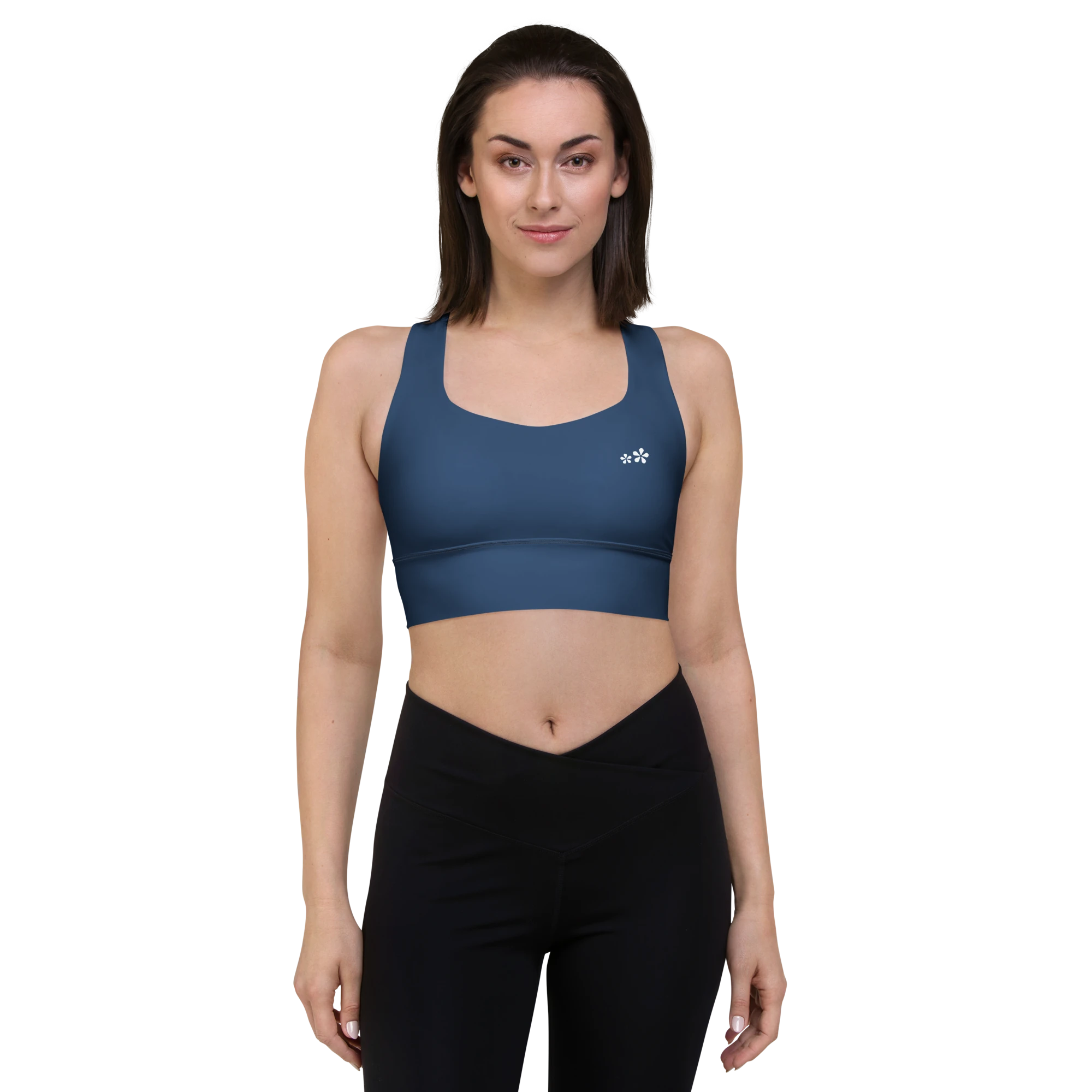 Front front view of the DuelStars Core Femme yoga sports bra in ocean blue, showcasing the delicate floral print and the fit of the straps.