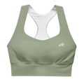 Front view flat lay of the DuelStars Core Femme sports bra in sage green, featuring the delicate Blossom logo on the chest.