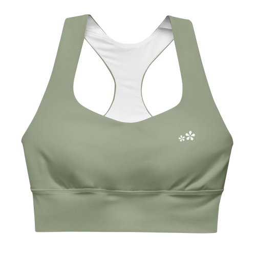 Front view flat lay of the DuelStars Core Femme sports bra in sage green, featuring the delicate Blossom logo on the chest.