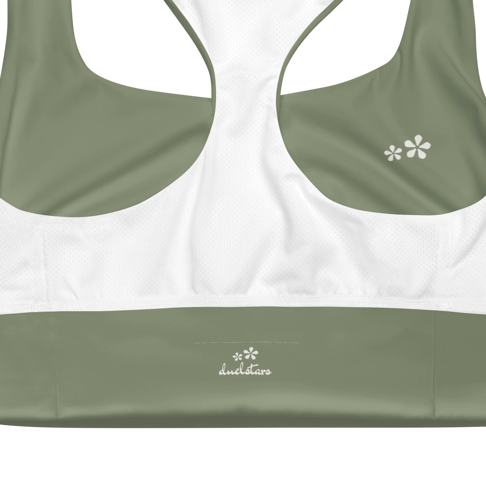 Close-up view of the inside label on the DuelStars Core Femme sports bra in sage green, showing the branded DuelStars logo 