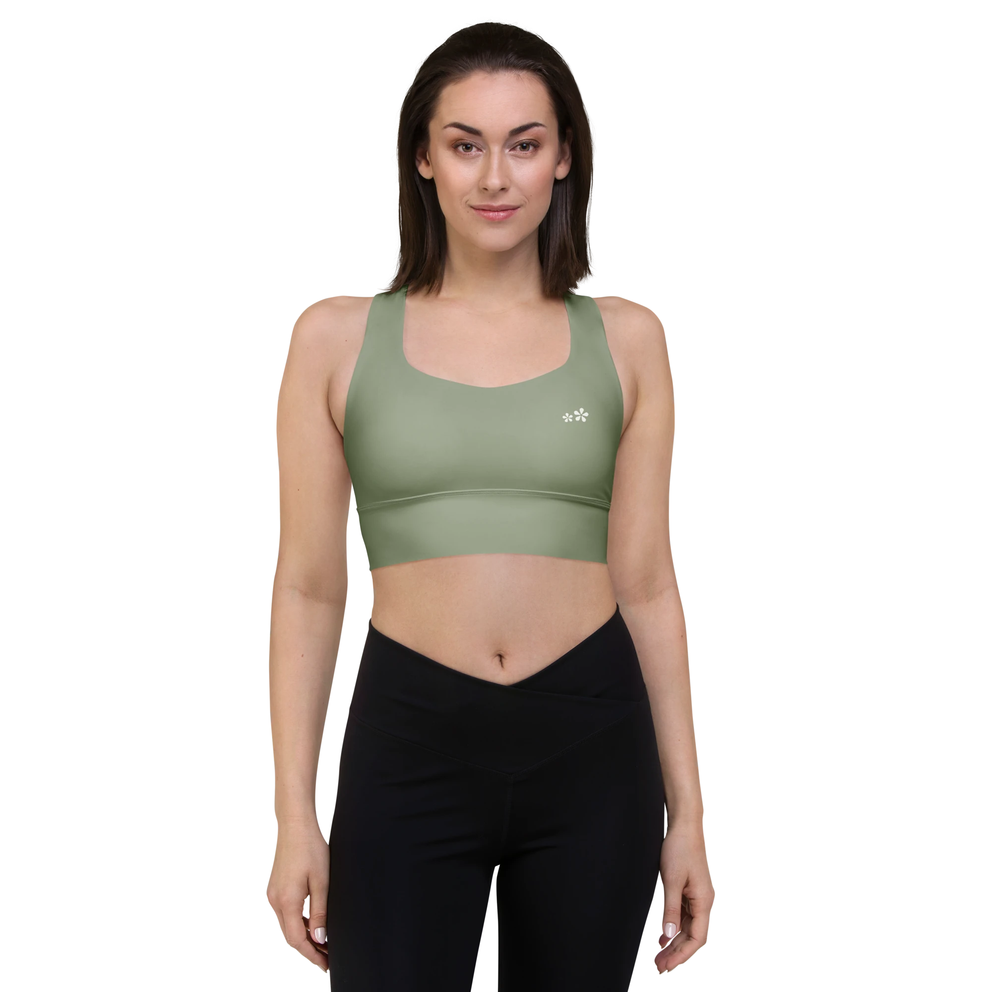 Front front view of the DuelStars Core Femme yoga sports bra in sage green, showcasing the delicate floral print and the fit of the straps.