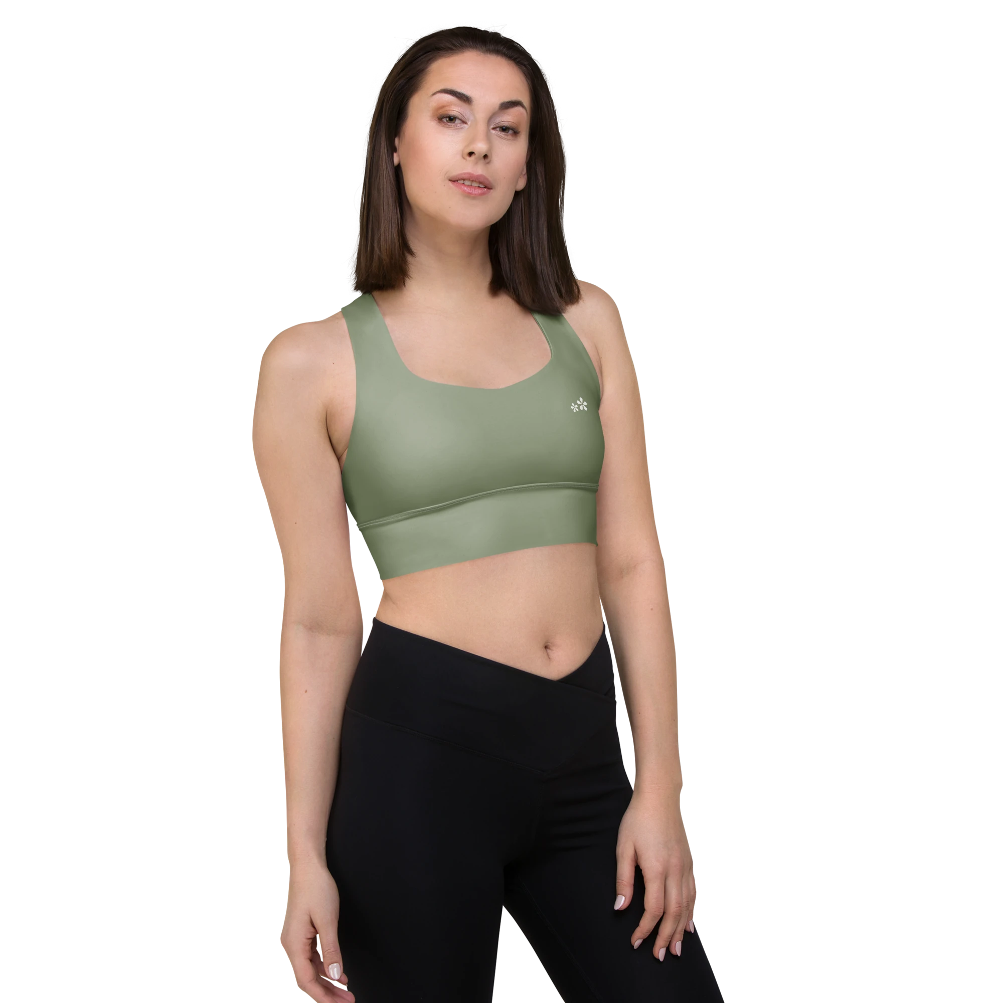 Front right-side view of the DuelStars Core Femme yoga sports bra in sage green, showcasing the delicate floral print and the fit of the straps.